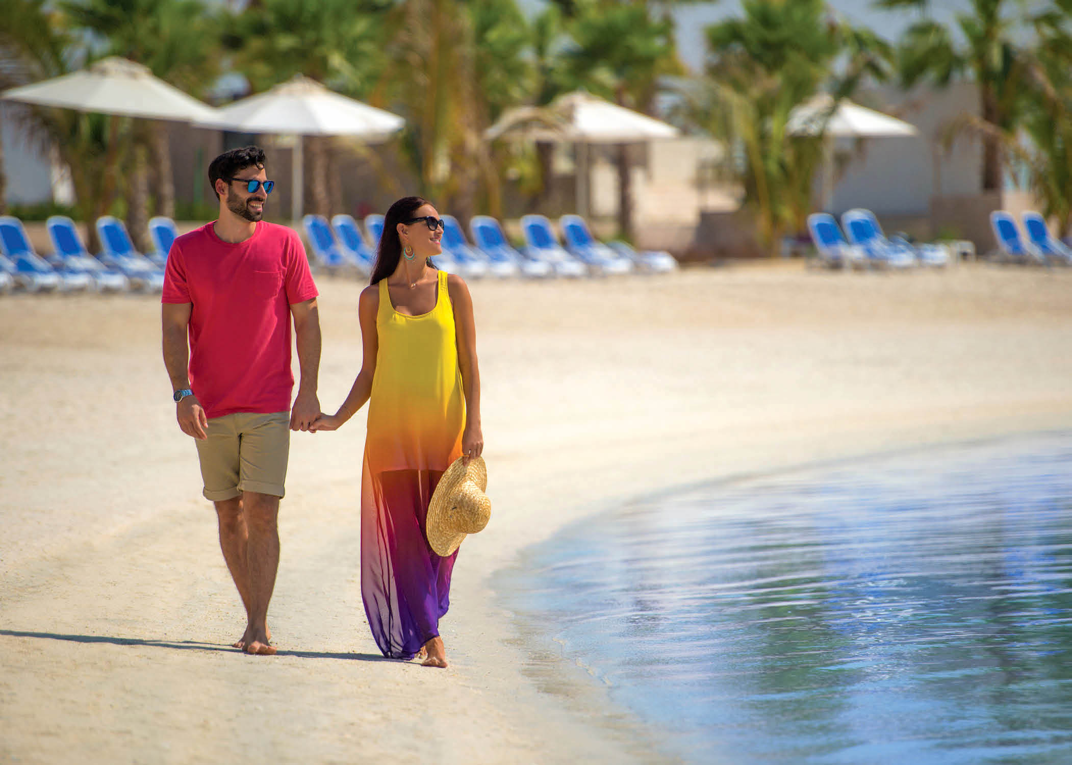 Doubletree by Hilton Resort Spa Marjan Island The Bay Club beach European couple 1