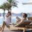 InterContinental Ras Al Khaimah Mina Al Arab Resort and Spa Infinity Pool Couple scaled 1