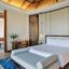 anantara mina al arab ras al khaimah resort guest room over water villa bedroom 29 1920x1037